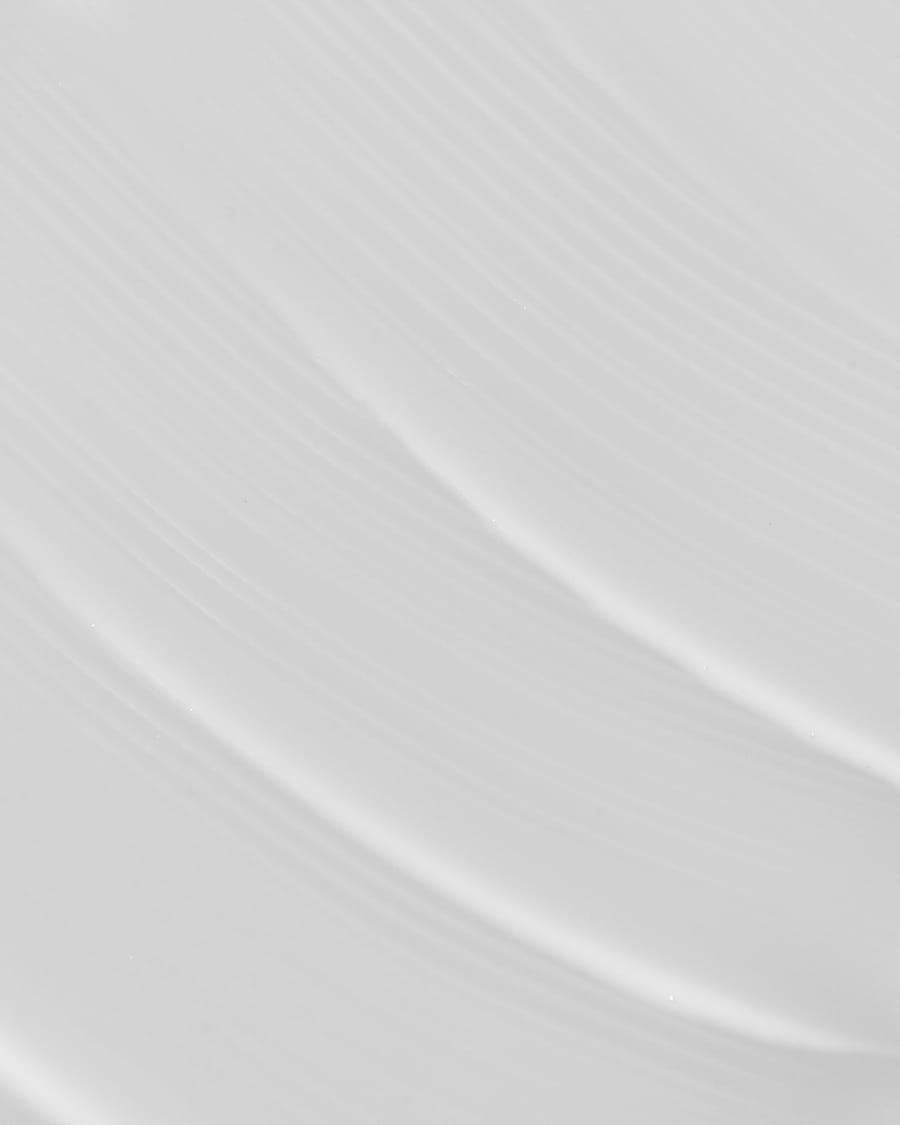 A smooth sweep of white cream, close up.